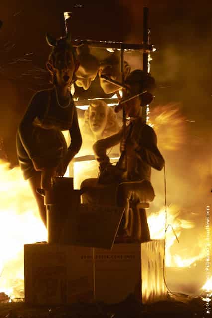 Combustible Ninot caricatures burn during the last day of the Fallas festival on March 19, 2012 in Valencia, Spain