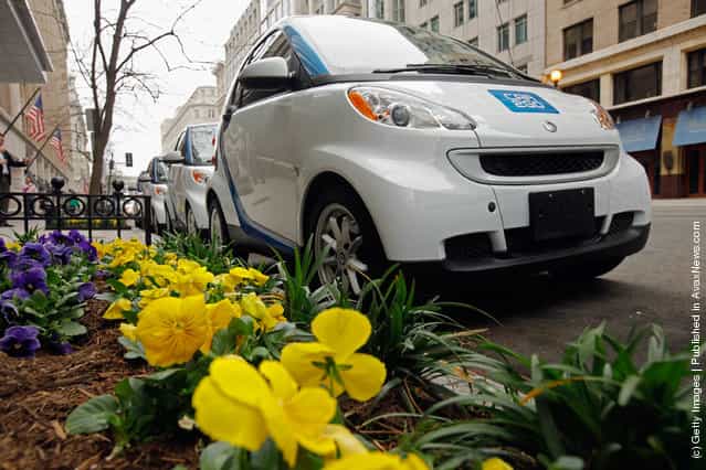 Car2go vehicles are lined up for display March 22, 2012 in Washington, DC