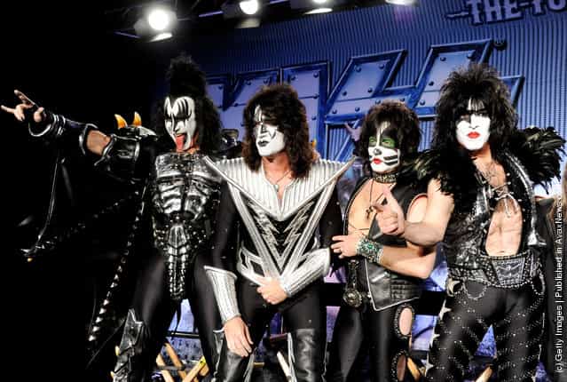 (L-R) Musicians Gene Simmons, Tommy Thayer, Eric Singer and Paul Stanley appear onstage to announce their upcoming Motley Crue and KISS co-headlining tour at the Hollywood Roosevelt Hotel