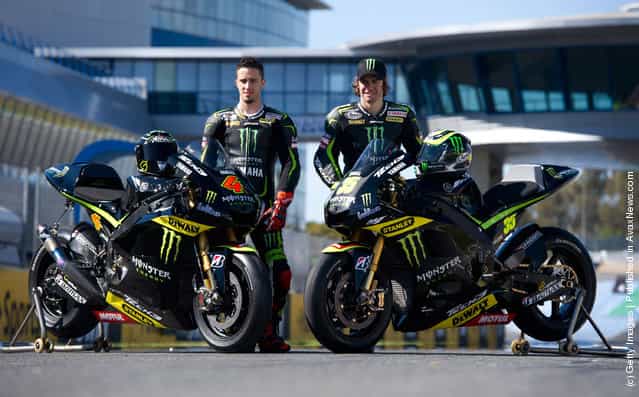(L-R) Andrea Dovizioso of Italy and Yamaha Tech 3 and Cal Crutchlow of Great Britain and Monster Yamaha Tech 3 pose with the bikes on track during the MotoGP Tests In Jerez at Circuito de Jerez