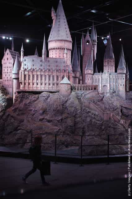 Visitors walk around a model of Hogwarts Castle at the Harry Potter Studio Tour at Warner Brothers Leavesden Studios