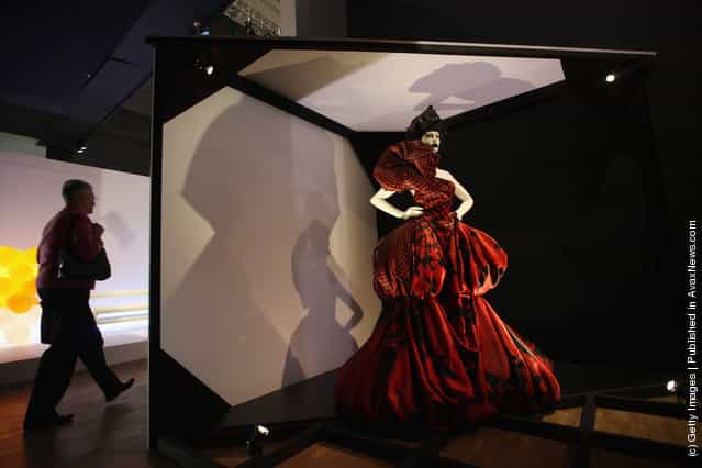 A dress designed by British designer Alexander McQueen stands on display at the Victoria and Albert museums new major exhibition