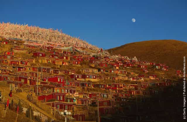 Monastic dormitories stand on the hillside at the Serthar Wuming Buddhist Study Institute in Serthar County of Garze Tibetan Autonomous Prefecture, Sichuan Province, China
