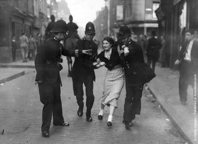 1936: Policemen arresting a demonstrator when fascists and communists clashed during a march led by British fascist Sir Oswald Mosley in London's East End