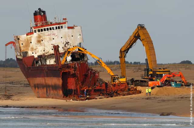 The bow removed, crews continue work to dismantle the TK Bremen, on Kerminihy beach, on January 13, 2012