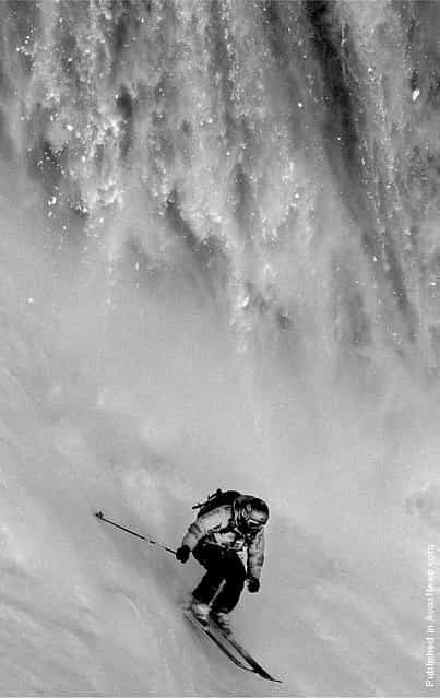 Professional freeride skier Phil Meier (Switzerland) escapes an oncoming avalanche during Freeride Quest, a qualifying event for Xtreme Verbier, the freeriding world championship
