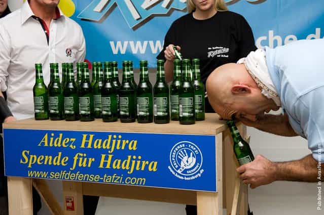 The most bottle caps removed with the head in one minute is 24. It was achieved by Ahmed Tafzi in Hamburg, Germany, on Nov. 16 as part of the Guinness World Records Day