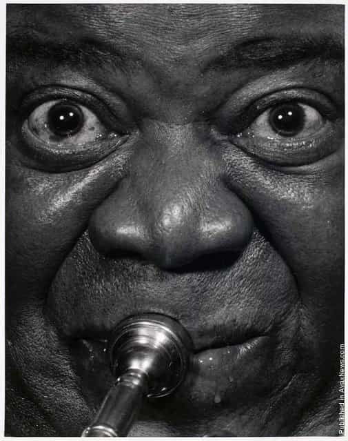 The American trumpeter, singer, composer and conductor Louis Armstrong. New York City, Halsman's studio. 15th April 1966