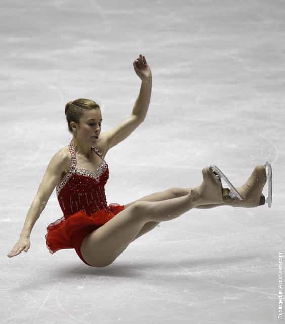 Ashley Wagner of the U.S. falls during her performance at the ladies' short programme at the World Team Trophy in Figure Skating in Tokyo April 19, 2012