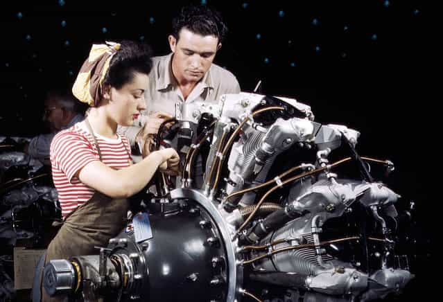 Women are trained as engine mechanics in thorough Douglas training methods, at the Douglas Aircraft Company in Long Beach, California, in October of 1942
