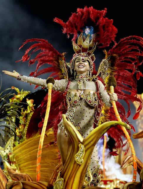 A dancer from the Dragoes da Real samba school performs in Sao Paulo