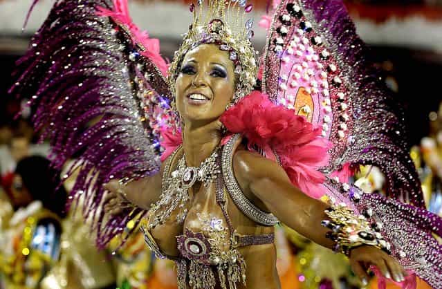 A dancer from the Aguia de Ouro samba school performs in Sao Paulo