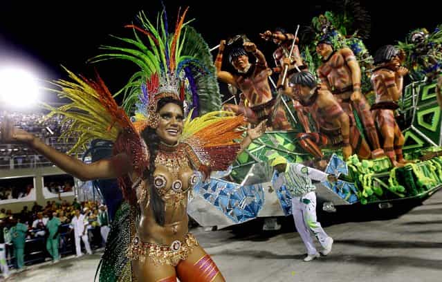 Performers from the Mocidade Independente de Padre Miguel samba school join in the celebrations at the Sambadrome in Rio de Janeiro