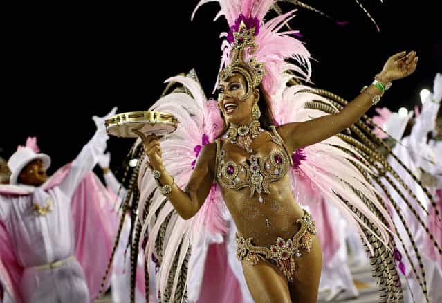 A dancer from the Mangueira samba school performs in Rio de Janeiro, Brazil