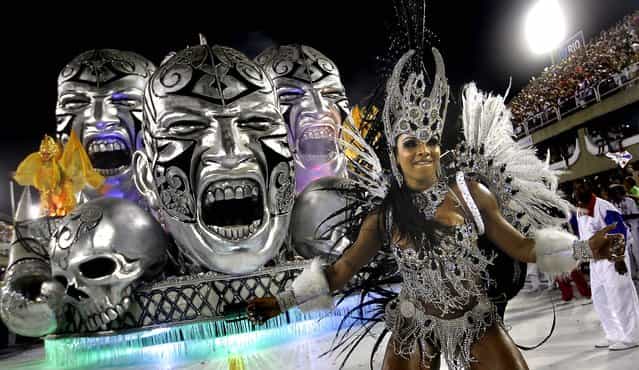A dancer from the Uniao da Ilha samba school performs at the Sambadrome in Rio de Janeiro