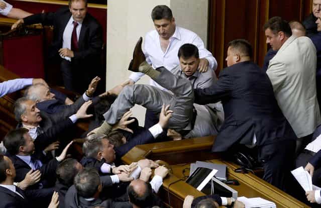 Lawmakers from pro-presidential and oppositional factions in the parliament session hall in Kiev, Ukraine on May 24, 2012