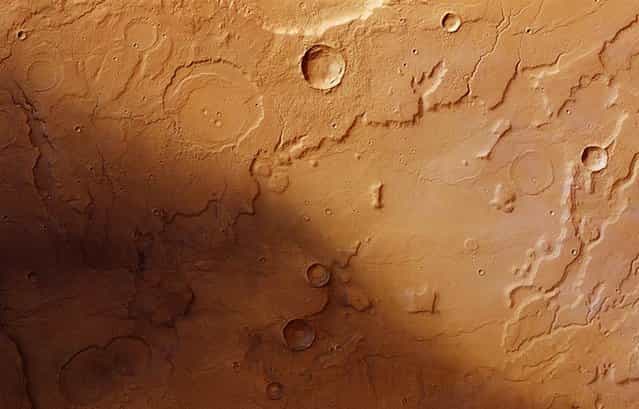 An image from the European Space Agencys Mars Express orbiter, released on May 4, 2012 shows channels cut into the terrain of Acidalia Planitia and Tempe Terra on the Red Planet
