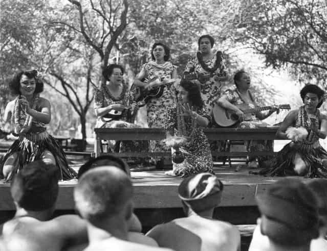 Dorothy Lamours entertain boys with Hawaiian hula