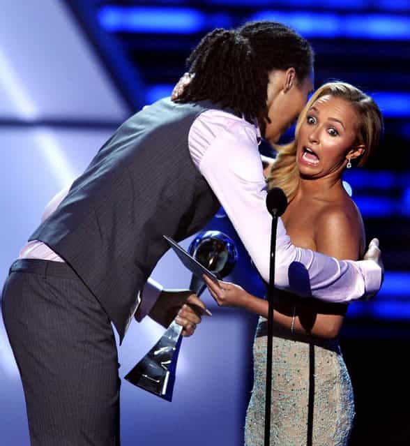 ESPY Awards 2012: American actress, singer and model Hayden Panettiere reacts as she's hugged by Brittney Griner after presenting her with the award for best female athlete