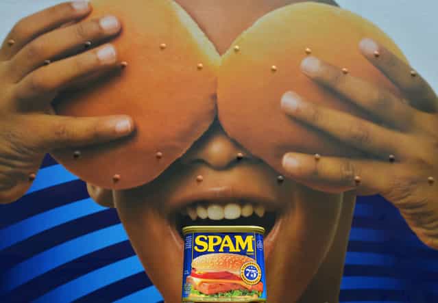 A can of Spam meat made by the Hormel Foods Corporation is pictured outside a store in front of a delivery truck in Silver Spring, Maryland, on July 5, 2012