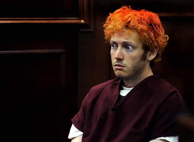 Mass murder James E. Holmes appears in Arapahoe County District Court on Monday, July 23, in Centennial, Colorado. Holmes is being held on suspicion of first-degree murder, and could also face additional counts of aggravated assault and weapons violations stemming from the mass shooting in a movie theater in Aurora that killed 12 and injured dozens of others. (Photo by RJ Sangosti/Denver Post)