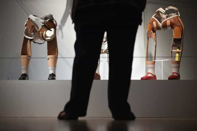 Prosthetic legs are exhibited at the Wellcome Trust's new exhibition [Superhuman] in London, England. The exhibit makes up part of the Wellcome Collection's new summer exhibition, [Superhuman], which focuses on the many ways mankind have sought to improve, adapt or enhance their body's performance, and opens to the public from July 19 to October 16, 2012. (Photo by Dan Kitwood)