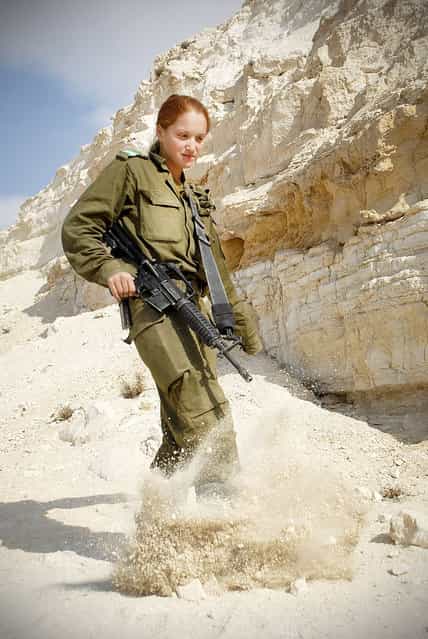 [Infantry Instructor at Field Training Week], November 16, 2010. In celebration of the upcoming International Womens Day, weve decided to share with you photos of women serving across the range of different units in the IDF. On the ground, in the sea, or in the air; the IDFs women take equal part in protecting Israel at all times. Pictured: A cadet in the Infantry Instructors Course during the Field Training Week, in which soldiers practice individual and group drills, navigation practice, sleeping in the field and camouflage training.