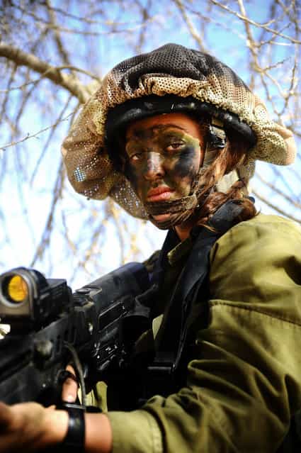 [Close Up]. Soldiers of the Caracal co-ed battalion during a platoon exercise in southern Israel, 2012.