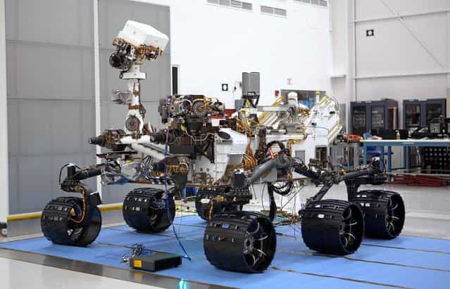 The Mars Science Laboratory rover, Curiosity, on May 26, 2011, in Spacecraft Assembly Facility at NASAs Jet Propulsion Laboratory in Pasadena, California. The rover was shipped to NASAs Kennedy Space Center, Florida, on June 22, 2011. (Photo by NASA/JPL-Caltech)