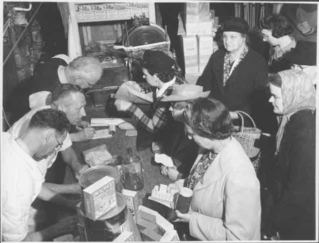 Women shopping with coupons during world War II in Drouin, Victoria, ca. 1944