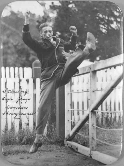 Athlete Nick Winter performing a standing high jump, Camden Showground, New South Wales, ca. 1925
