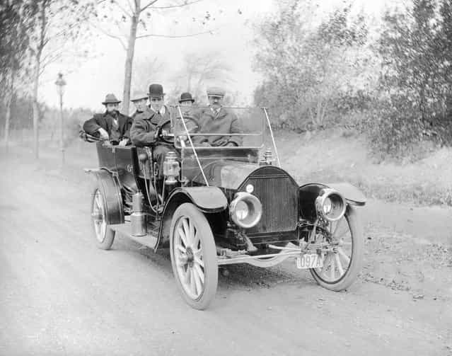 Aviation pioneer Claude Grahame-White (1879–1959) at the wheel of a motor car during the filming of a Western film, with other members of the cast as passengers, 1910.