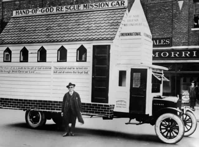 Herman Frics, one-time saloonkeeper and now evangelist and principal supporter of the Hand Of God Mission of Brooklyn, New York, with the church on wheels, which he takes into the city's slums to preach, circa 1925.