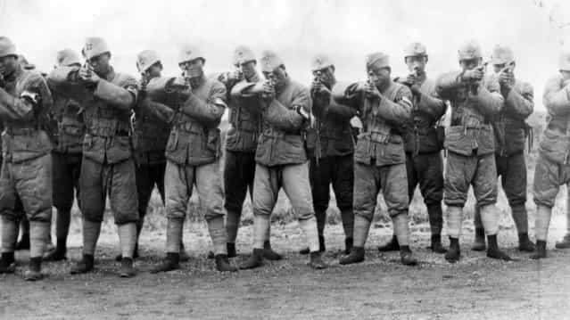 A squad of Marshal Sun's shock troops armed with Mauser pistols during training at Shanghai during civil war in China, 1927.