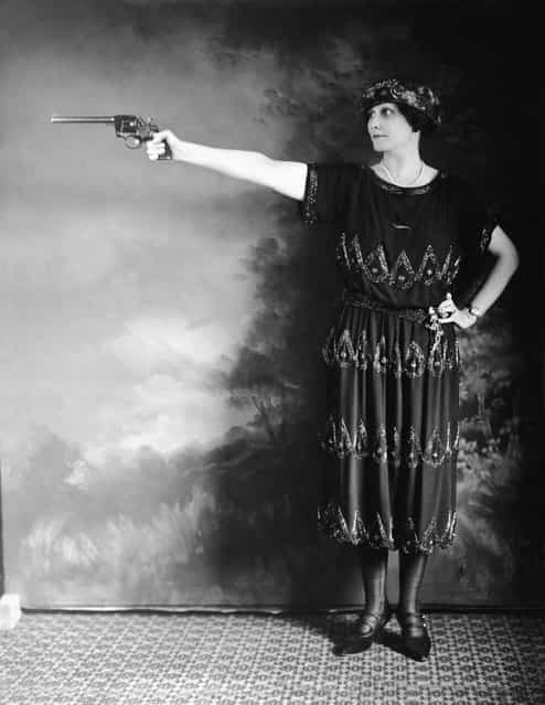 Mrs. Lee Rothan stands in a pistol-firing stance, early 20th Century (circa 1918). Rothan, of Houston, Texas, was one of the best amateur shooters in the South. (Photo by Keystone)