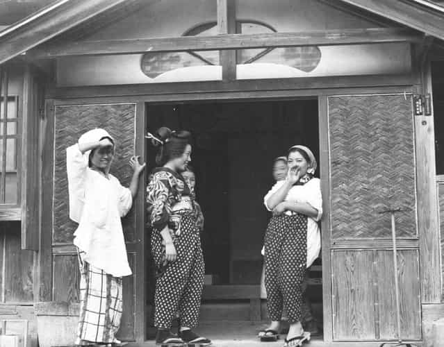 A group of country Geisha and maids in a rural town, circa 1943. The spotted overalls they wear for protection when working in the fields or about the house are called Mampei. (Photo by Three Lions)