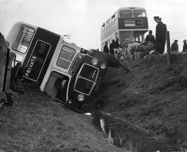 A school bus that overturned and toppled into a ditch near Rye, Sussex. 21st April 1966. (Photo by Keystone)