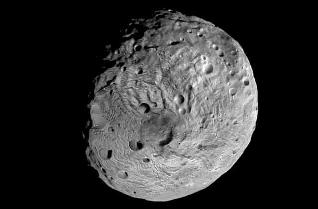 This undated image taken by the NASA's Dawn spacecraft shows the south pole of the giant asteroid Vesta. After spending a year examining Vesta, Dawn was poised to depart and head to another asteroid Ceres, where it will arrive in 2015. (Photo by AP Photo/NASA)