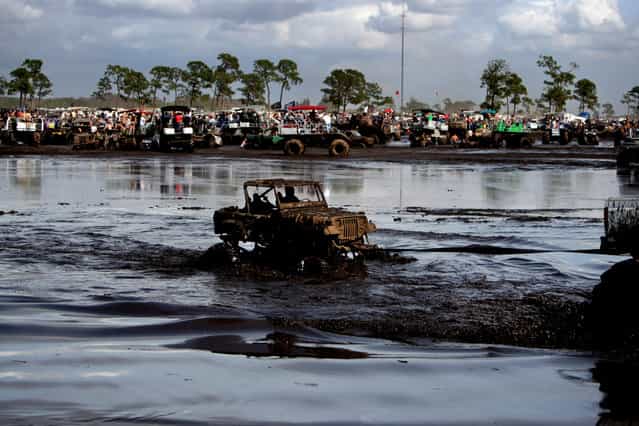 The 2012 Okeechobee Mudfest at 11705 Highway 70 East in Okeechobee. The three day festival has over 205 acres of mud pits for trucks, swamp buggies, all terrain vehicles and modified trucks. The cost is $40 for the weekend and includes overnight camping. (Photo by Gary Coronado/The Palm Beach Post)