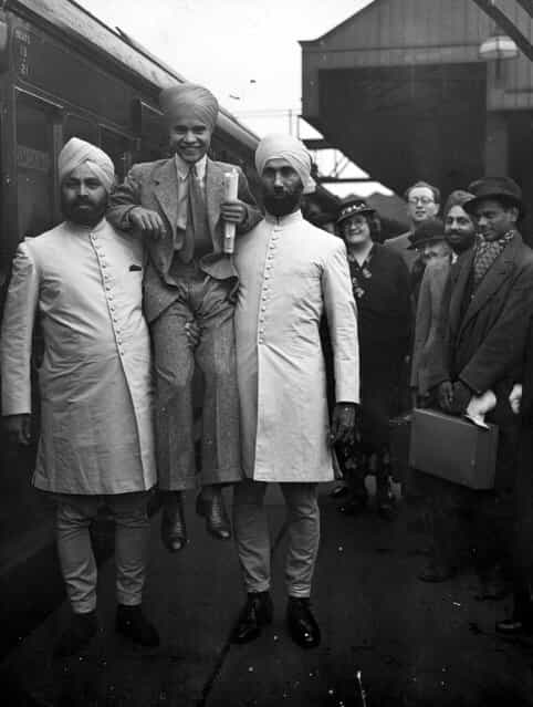 Young Indian actor Sabu (1924–1963) leaves Waterloo station in London on his way to New York, for the premiere of his latest film [The Drum]. 7th September 1938. (Photo by Stephenson/Topical Press Agency)