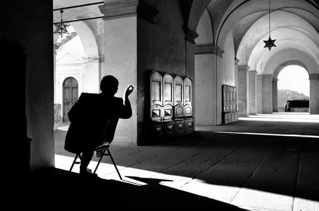 Relax: Photo taken of the guardian of the Medici's Villa at Poggio a Caiano, in Italy, where at the end of the working day he is allowed a cigarette. (Photo by Giacomo Baldi/National Geographic Photo Contest