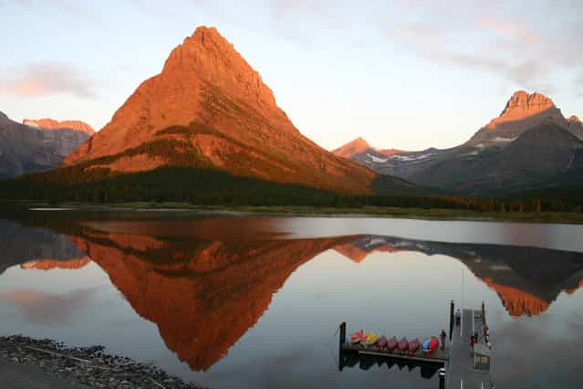 Sunrise in Glacier: I took this from the balcony of Many Glacier Lodge in Glacier National Park, on August 1, 2012. The sun was rising behind me and onto the mountains. (Photo by Sharon Lyon/National Geographic Photo Contest