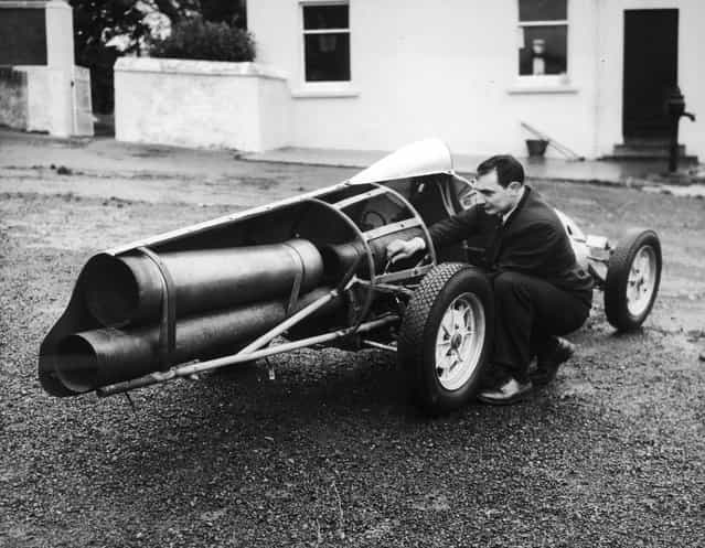Mr. J. L. M. Meikle, a member of the 500 Motor Racing Club of Ireland at his him in Bangor, Wales, with a jet-propelled racing car that he has built. 10th January 1957 (Photo by MacMullan/Fox Photos)