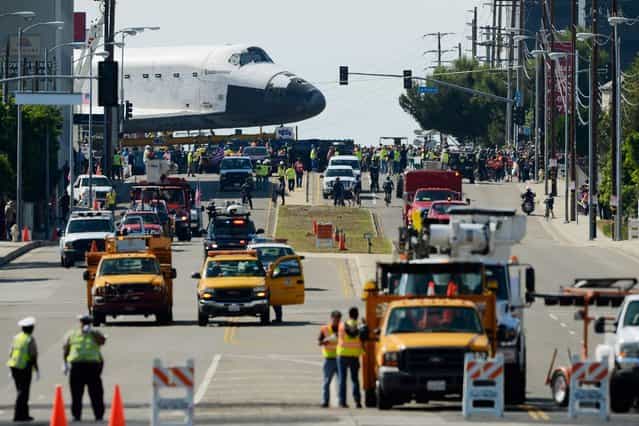 The space shuttle Endeavour is transported to the California Science Center in Exposition Park from Los Angeles International Airport (LAX) on October 12, 2012 in Los Angeles, California. (Photo by Kevork Djansezian)