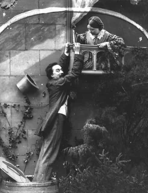 An aspiring Romeo tries to climb to his beloved Juliet's balcony but finds the lid of a water butt is not safe to stand on. London Stereoscopic Company Comic Series, circa 1860. (Photo by London Stereoscopic Company)