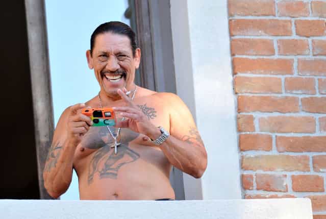 Actor Danny Trejo looks out from his hotel balcony during the 67th Venice Film Festival on September 1, 2010 in Venice, Italy. (Photo by Gareth Cattermole)