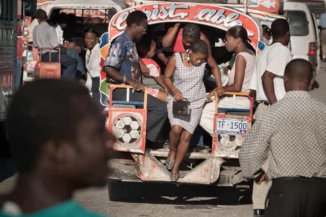Port-au-Prince, Haiti.Taptap, group bus, stop at the airport crossroads in Delmas in November 2003. (Photo by Jean-Claude Coutausse)