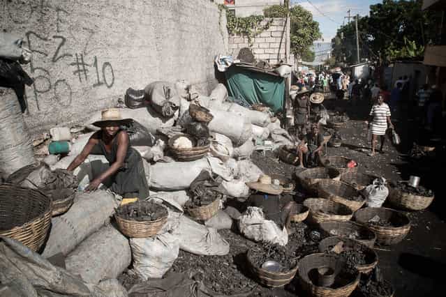 Port-au-Prince, Haiti. Charcoal seller in November 2003. (Photo by Jean-Claude Coutausse)