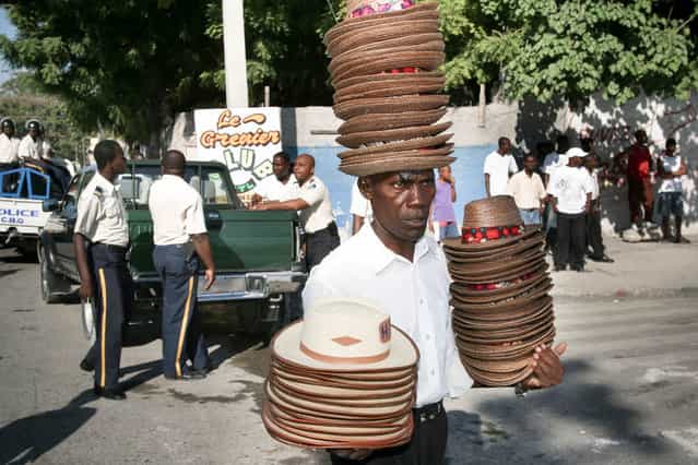 Port-au-Prince, Haiti. Hats seller on the Champ de Mars in November 2003. (Photo by Jean-Claude Coutausse)