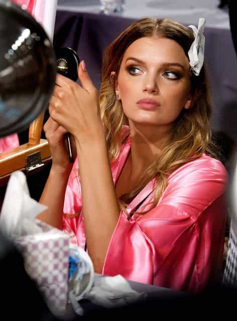 Lily Donaldson appears backstage in hair and makeup at The Victoria's Secret Fashion Show in New York. (Photo by Charles Sykes/Evan Agostini)